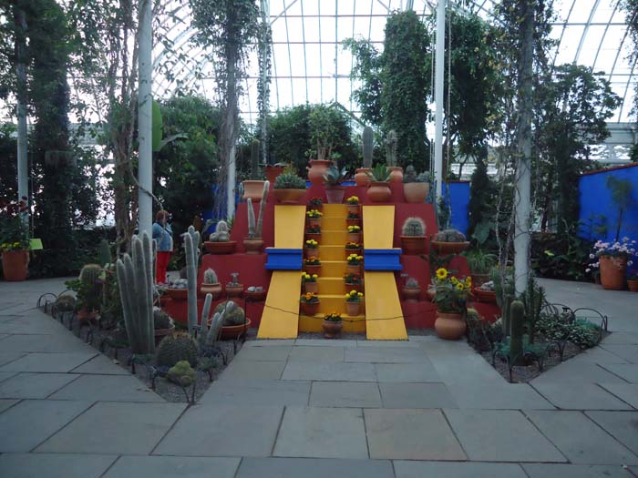The blue walls of Frida Kahlo's "Casa Azul," a scene at "Frida Kahlo: Art, Garden, Life," at The New York Botanical Garden.Photo: NY Arts/J.Gora