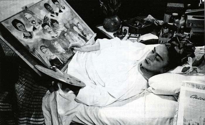 Frida Kahlo, painting in bed. Coyoacán, Mexico archives.