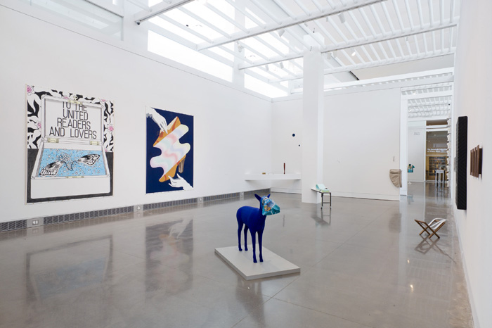 Installation view, 2013-2015 Queens Museum Studio Program Exhibition. From left: on wall, Caitlin Keogh; on floor, Galeria Perdida; far end of gallery, Juan Betancurth. Photo by Hai Zhang.