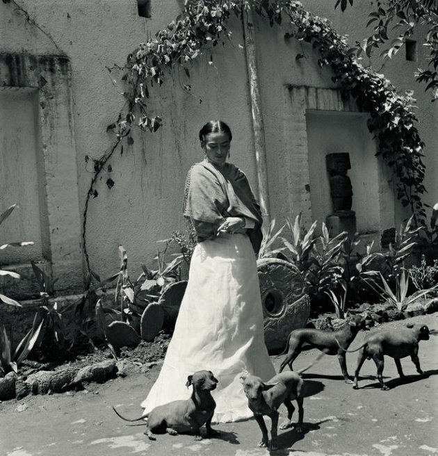 Frida Kahlo with her dogs in Coyoacán, Mexico City, 1951—Photo: © Gisèle Freund / IMEC / Fonds MCC