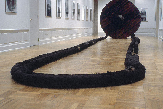 Wheel with Rope — Magdalena Abakanowicz, 1973 Wood, burlap, hemp, metal line 2 wheels, diameter each: 7 ft 8 1/8 in (2.34 m) 2 ropes, each approx: 190 ft (58 m) National Museum in Wrocław, Poland. © Magdalena Abakanowicz Courtesy Marlborough Gallery, New York 