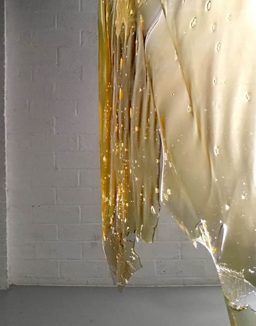 CONSUME, 2016 Ioannis Oikonomou, Eirini Tsachrelia Edible translucent colored gelatin, vinyl mold, monofilament line Dimensions approximately 11’6” x 4’6” x 10” (3,5 x 1,4 x .25 m). Detail.